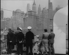 Passengers of the Queen Mary Looking Out at New York City, 1936. Creator: British Pathe Ltd