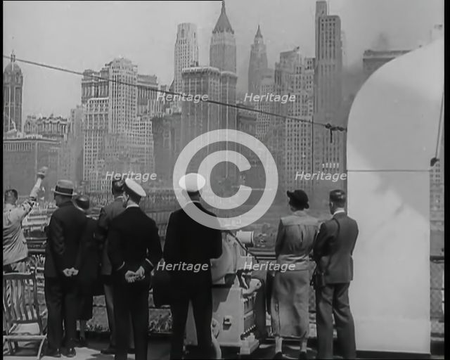 Passengers of the 'Queen Mary' Looking Out at New York City, 1936. Creator: British Pathe Ltd.