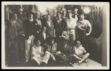 Passengers on RMS Armadale Castle, some in drag, pose for a group portrait, 1933. Creator: Unknown