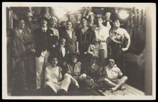 Passengers on RMS Armadale Castle, some in drag, pose for a group portrait, 1933. Creator: Unknown