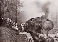 Passengers queuing for a steam rain at Rowntree's halt, York, Yorkshire, 1934