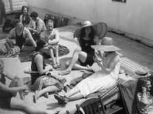 Passengers sunbathing on board a cruise ship, c1920s-c1930s(?)