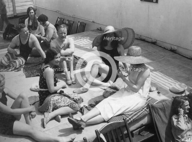 Passengers sunbathing on board a cruise ship, c1920s-c1930s(?). Artist: Unknown