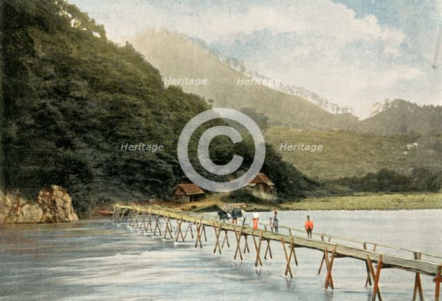 'Passerelle Sur La Riviere D'Arakawa', (Footbridge over the Arakawa River), 1900. Creator: Unknown.