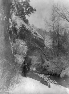 Passing the cliff-Apsaroke, c1908. Creator: Edward Sheriff Curtis