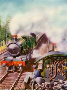 Passing at Speed. An unusual view from the tender of a goods engine 1935-36. Creator: Unknown