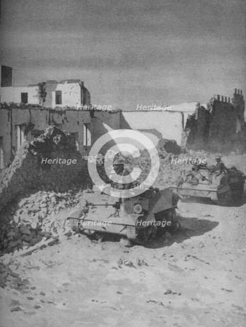 'Past Graziani's Shattered Stronghold Lies the Conquerors' Road', 1941.  Artist: Unknown.