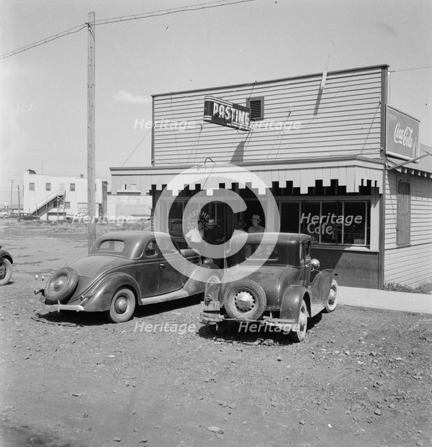 Pastime Cafe on main street of small potato town, Tulelake, Siskiyou County, California, 1939. Creator: Dorothea Lange.