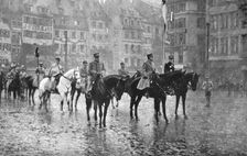 Petain et Foch a Strasbourg; Le 27 novembre: le marechal Foch, a cheval, entre les..., 1918. Creator: Unknown