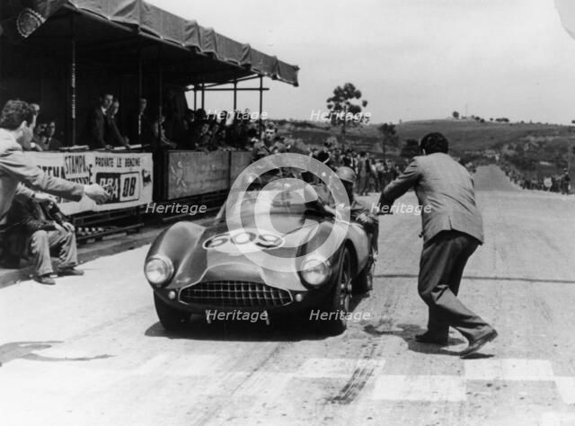 Peter Collins at the wheel of an Aston Martin. Artist: Unknown