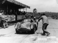 Peter Collins at the wheel of an Aston Martin