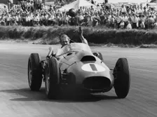 Peter Collins celebrates with lap of honour in Ferrari, 1958 British GP. Creator: Unknown