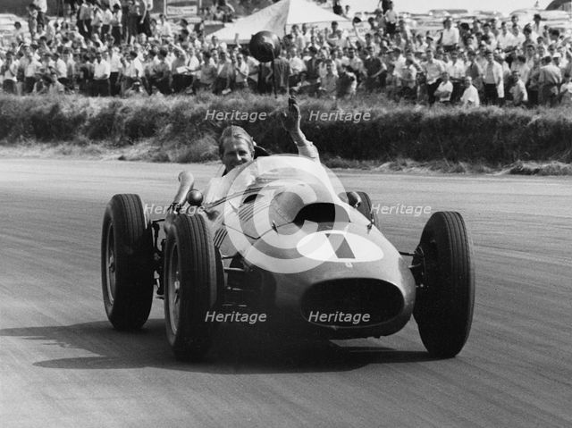 Peter Collins celebrates with lap of honour in Ferrari, 1958 British GP. Creator: Unknown.