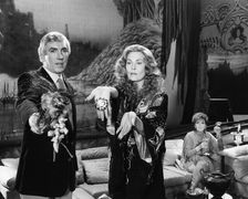 Peter Cook (1933-94) and Faye Dunaway (1941- ), 1984