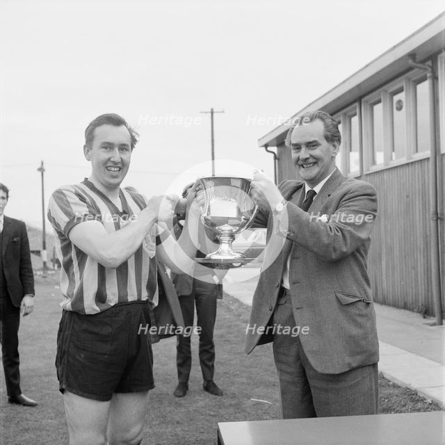 Peter Hipkin, captain of the Laing Sports Club's 1st football team, 27/04/1963. Creator: John Laing plc.