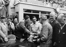 Peter Whitehead being congratulated on his victory with Peter Walker of the Le Mans 24 hours, 1951