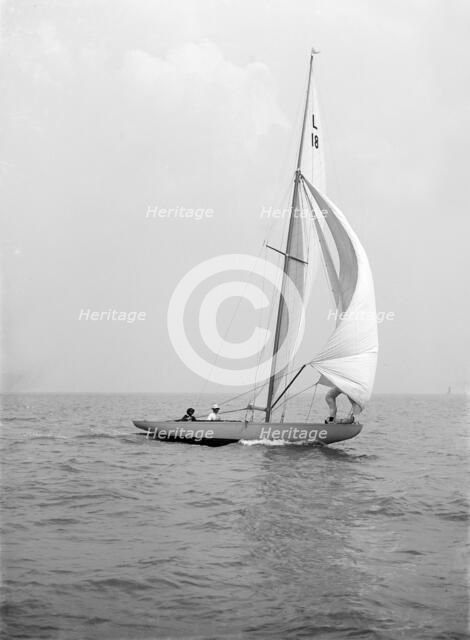 'Peterkin' running downwind with spinnaker, 1914. Creator: Kirk & Sons of Cowes.