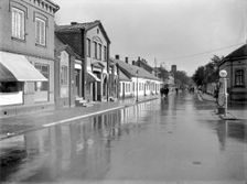 Petrol pump in a built-up area, Landskrona, Sweden, 1930. Creator: Unknown