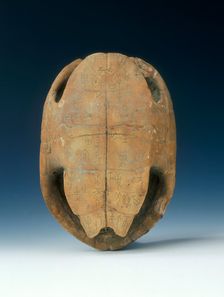 Petrified tortoise shell with oracle bone inscriptions, possibly Shang Dynasty, China, c1400 BC