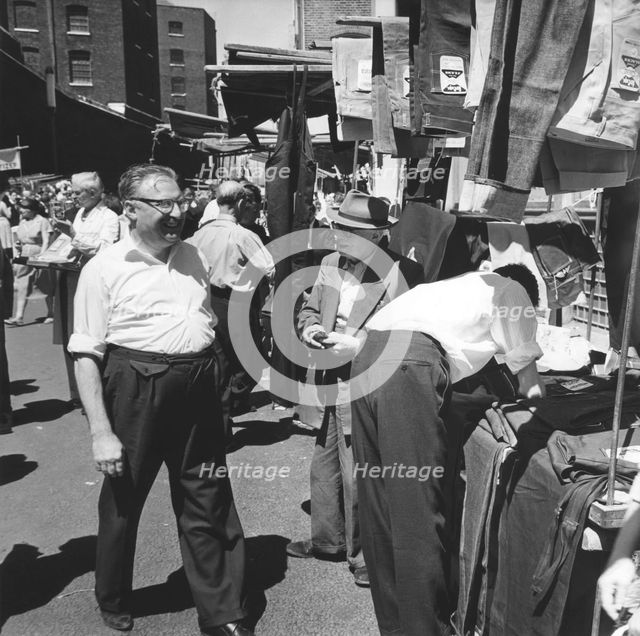 Petticoat Lane market, London, 1964. Creator: EH Emanuel.