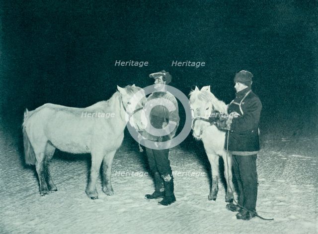 'Petty Officers Crean and Evans Exercising Their Ponies in the Winter', 1911, (1913). Artist: Herbert Ponting.
