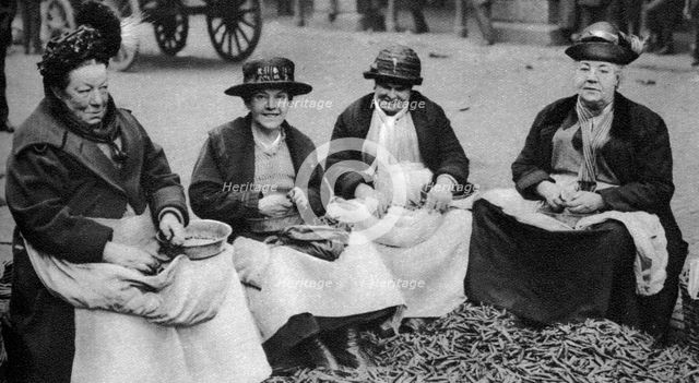 Pea shelling in Covent Garden, London, 1926-1927. Artist: Unknown
