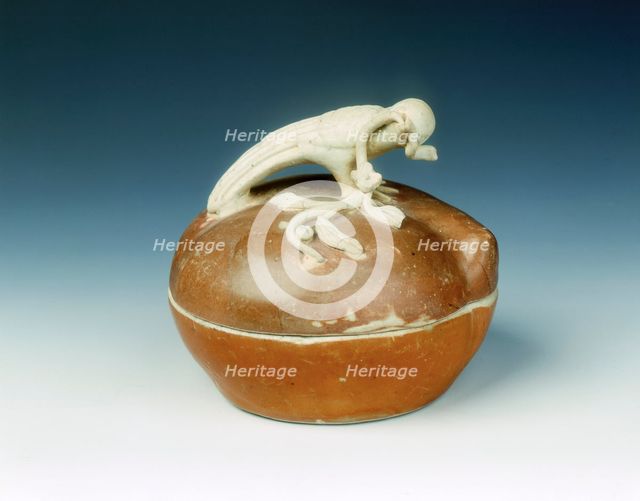 Peach shaped covered box with unglazed pigeon in relief, Ming dynasty, China, 16th century. Creator: Unknown.
