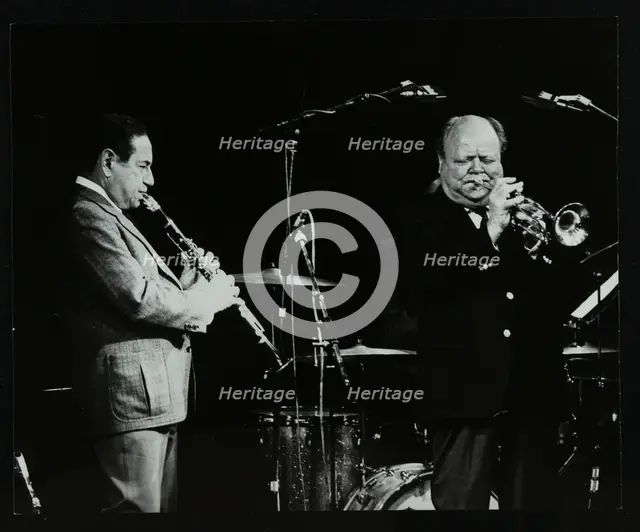 Peanuts Hucko and Billy Butterfield playing at Potters Bar, Hertfordshire, 1986. Creator: Denis Williams.