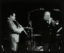Peanuts Hucko and Billy Butterfield playing at Potters Bar, Hertfordshire, 1986. Creator: Denis Williams