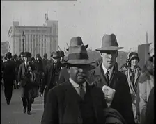 Pedestrians And Commuters Crossing London Bridge, 1920s. Creator: British Pathe Ltd