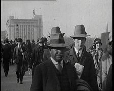 Pedestrians And Commuters Crossing London Bridge, 1920s. Creator: British Pathe Ltd