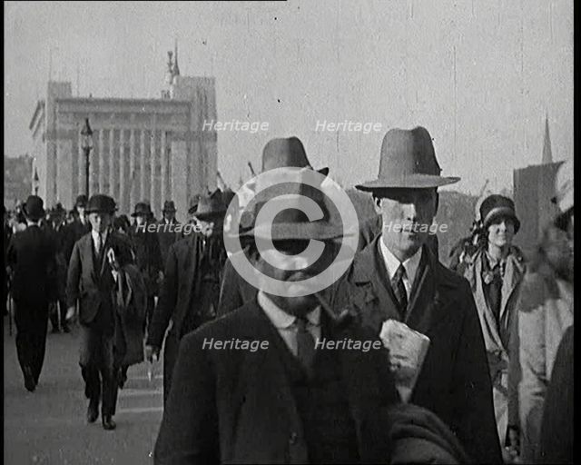 Pedestrians And Commuters Crossing London Bridge, 1920s. Creator: British Pathe Ltd.