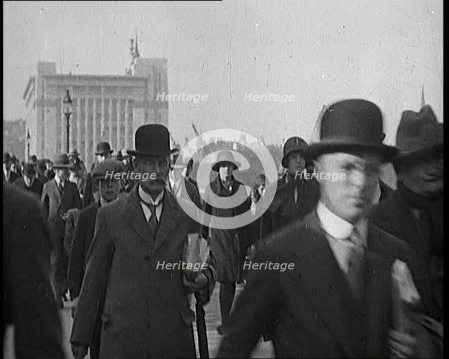 Pedestrians And Commuters Crossing London Bridge, 1920s. Creator: British Pathe Ltd.