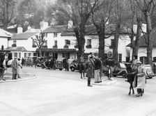 Pedestrians and riders outside the Burford Bridge Hotel, Surrey, (c1930s?)