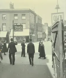 Pedestrians and tram sign outside Waterloo Station, Lambeth, London, 1929