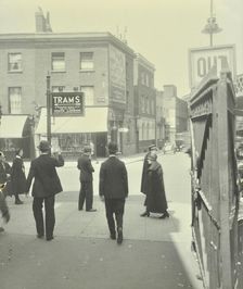 Pedestrians and tram sign outside Waterloo Station, Lambeth, London, 1929