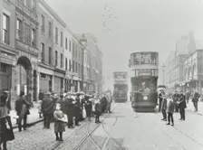 Pedestrians and trams in Commercial Street, Stepney, London, 1907