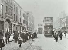 Pedestrians and trams in Commercial Street, Stepney, London, 1907