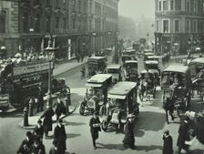 Pedestrians and traffic, Victoria Street, London, April 1912