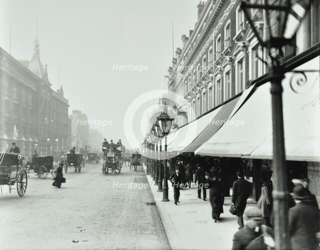 Pedestrians outside DH Evans, Oxford Street, London, 1903. Artist: Unknown.