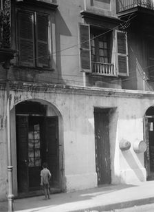 Pedesclaux-Lemonnier House, 640 Royal Street, New Orleans, between 1920 and 1926. Creator: Arnold Genthe