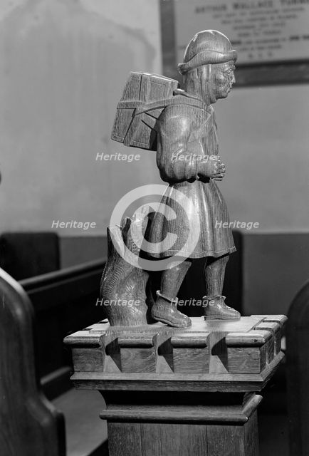 'Pedlar' pew end, Swaffham, Norfolk, 1964. Artist: Laurence Goldman