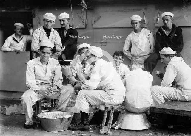 Peeling potatoes on USS Arkansas, between c1910 and c1915. Creator: Bain News Service.