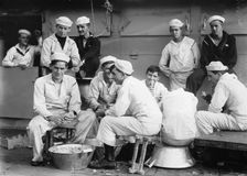 Peeling potatoes on USS Arkansas, between c1910 and c1915. Creator: Bain News Service