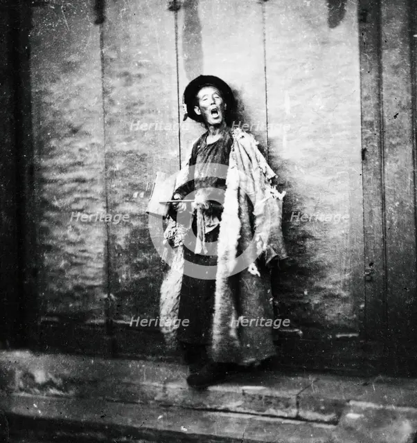 Peking, Pechili province, China: a nightwatchman, 1869, (1981). Creator: Unknown.