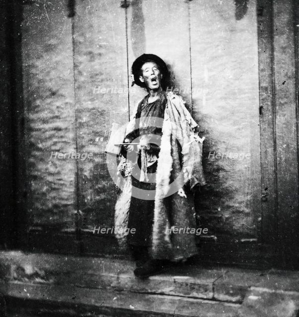 Peking, Pechili province, China: a nightwatchman, 1869, (1981). Creator: Unknown.