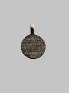 Pendant with Lion and Scorpion, Iran, 10th century. Creator: Unknown