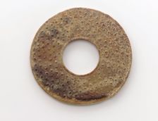 Pendant in the form of a disk (bi) with raised knobs, Zhou dynasty, 475-221 BCE. Creator: Unknown