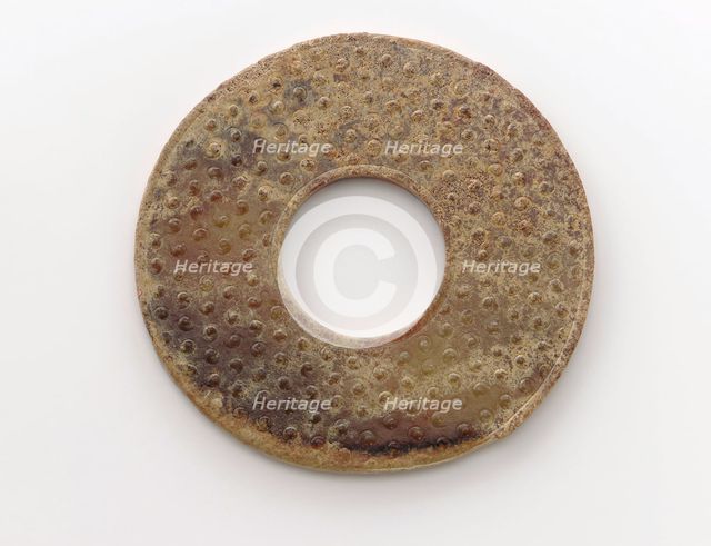 Pendant in the form of a disk (bi) with raised knobs, Zhou dynasty, 475-221 BCE. Creator: Unknown.
