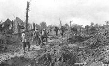 Pendant l'action; Pour assurer la securite du terrain repris: transport a travers..., 1916 (1924) Creator: Unknown